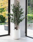 Artificial Eucalyptus Tree UV/IFV in White Ribbed Stone Planter